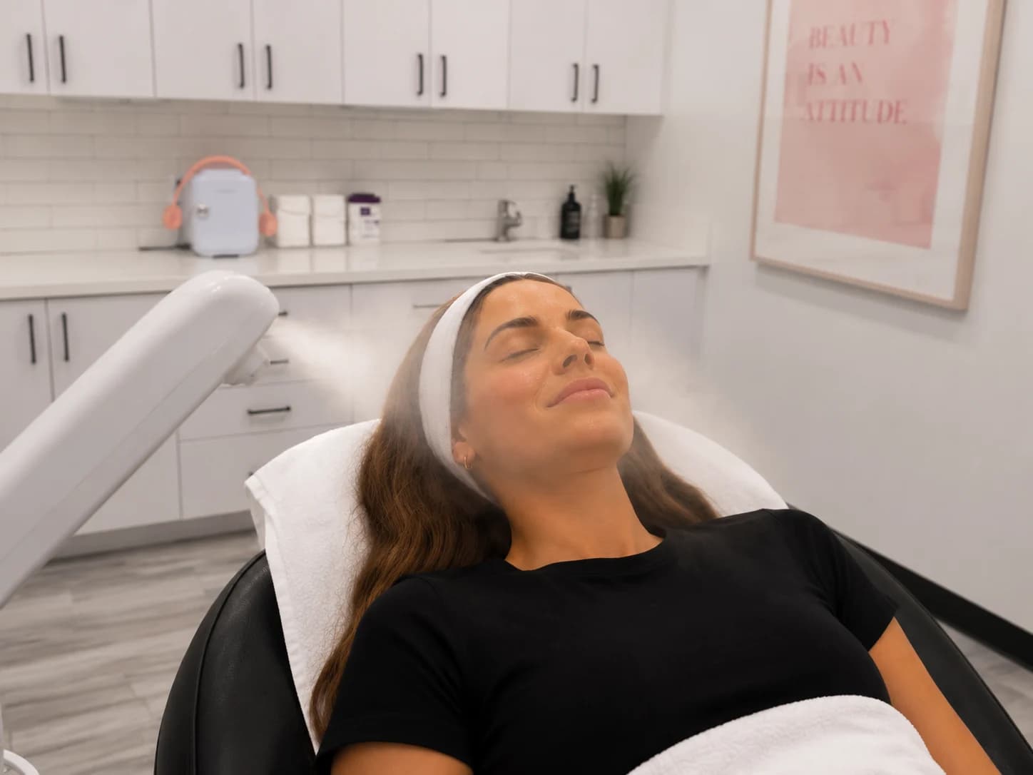 Client receiving Steam and Clean facial steam treatment.